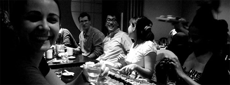 Visiting scholars and UC San Diego International House residents share a sushi dinner