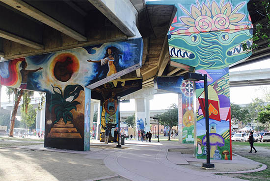 Colorful murals underneath the bridge at Chicano Park, San Diego. Photo credit: Slice of San Diego, International House, UC San Diego